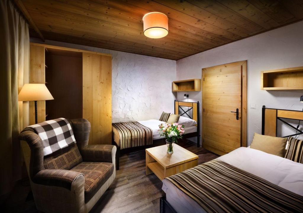 Postel nebo postele na pokoji v ubytování Chalets Jasná Collection - Apartments