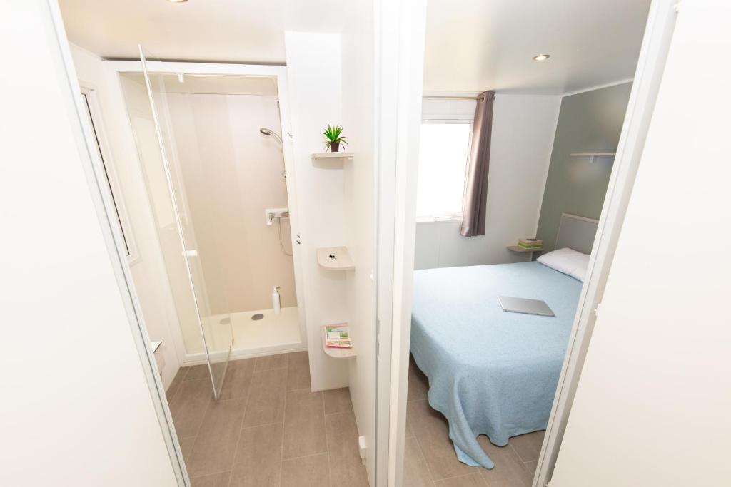 Cama o camas de una habitación en Càmping Bellsol