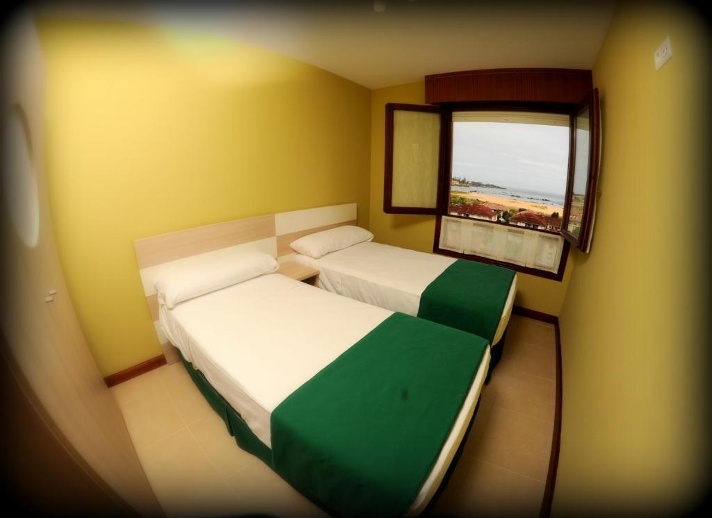 Posteľ alebo postele v izbe v ubytovaní Apartaments La Reserva Premium