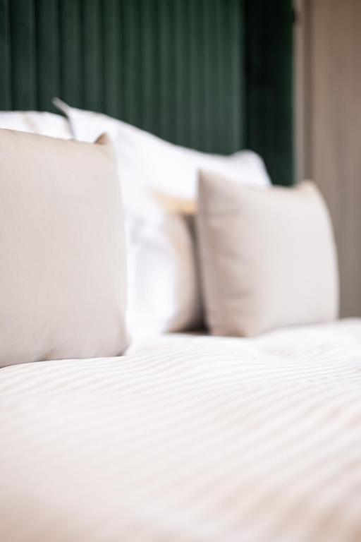 Letto o letti in una camera di R.HOTEL