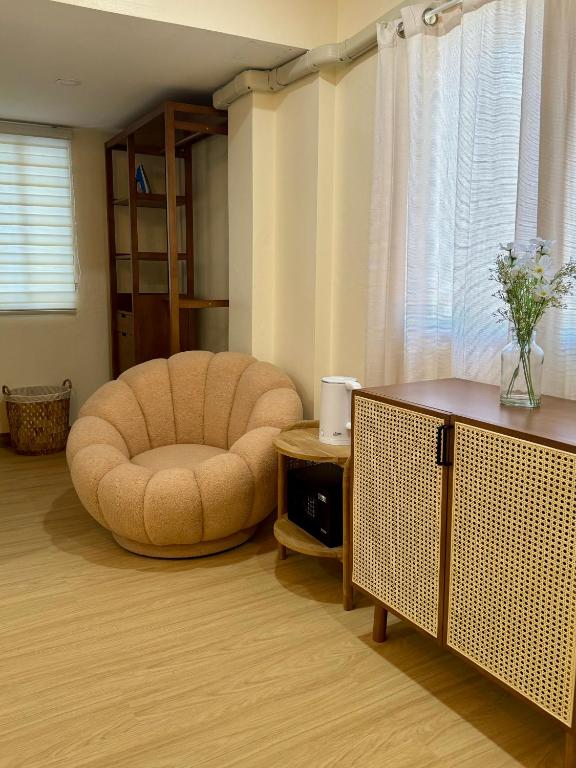 Posezení v ubytování L’Oasis Nanai