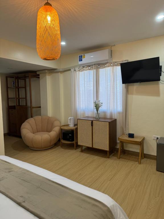 TV a/nebo společenská místnost v ubytování L’Oasis Nanai