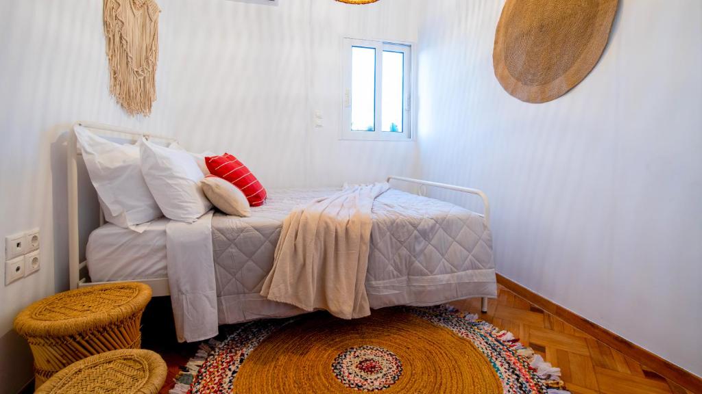 Postel nebo postele na pokoji v ubytování Piraeus Urban Gem