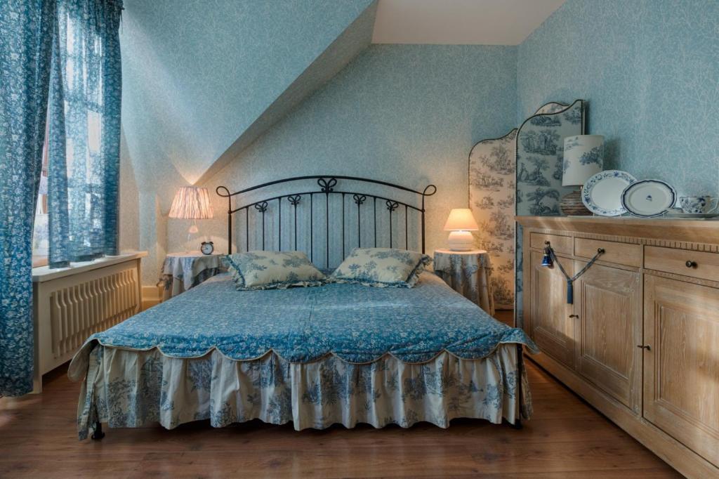 Postel nebo postele na pokoji v ubytování Villa Rosa