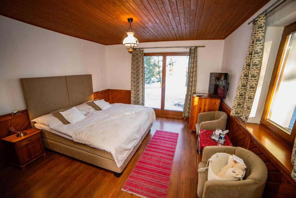 Postel nebo postele na pokoji v ubytování Oravský Háj Garden Hotel & Resort