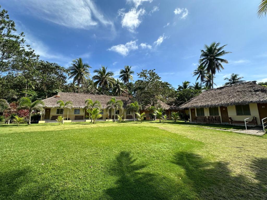 Zahrada ubytování Dancalan Beach Resort