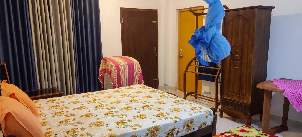 Postel nebo postele na pokoji v ubytování Raviru Guest Mirissa