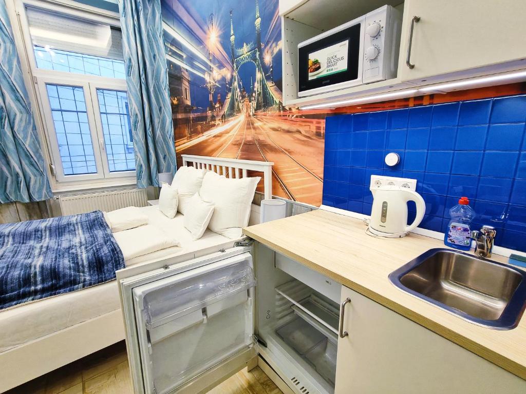 Kuchyňa alebo kuchynka v ubytovaní King Apartment