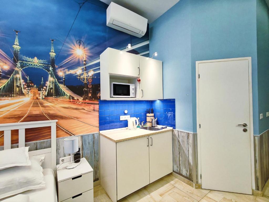 Kuchyňa alebo kuchynka v ubytovaní King Apartment
