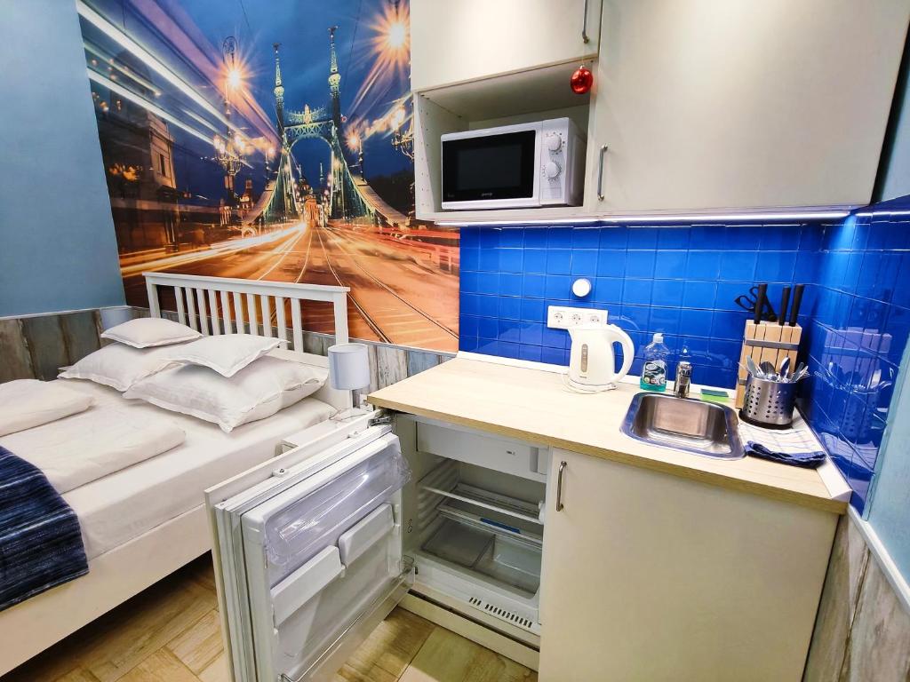 Kuchyňa alebo kuchynka v ubytovaní King Apartment