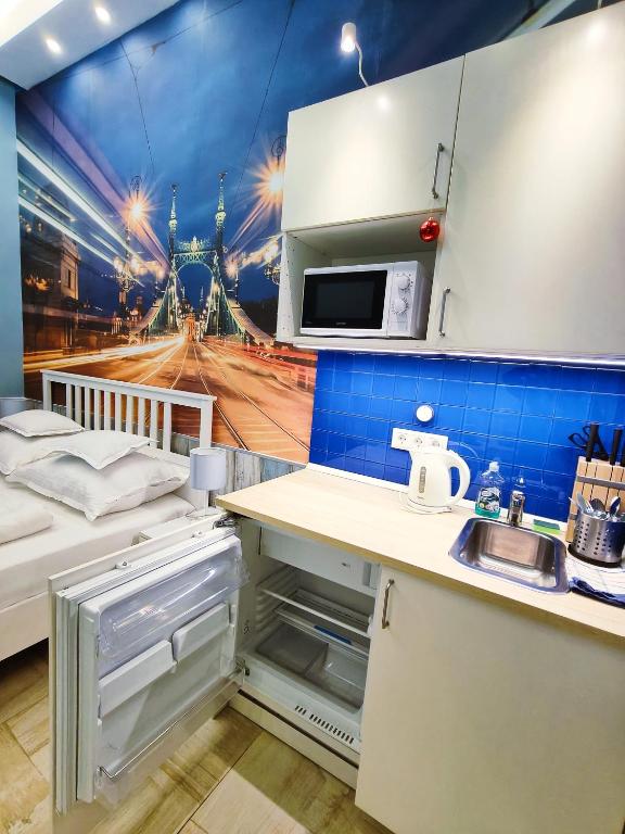 Kuchyňa alebo kuchynka v ubytovaní King Apartment