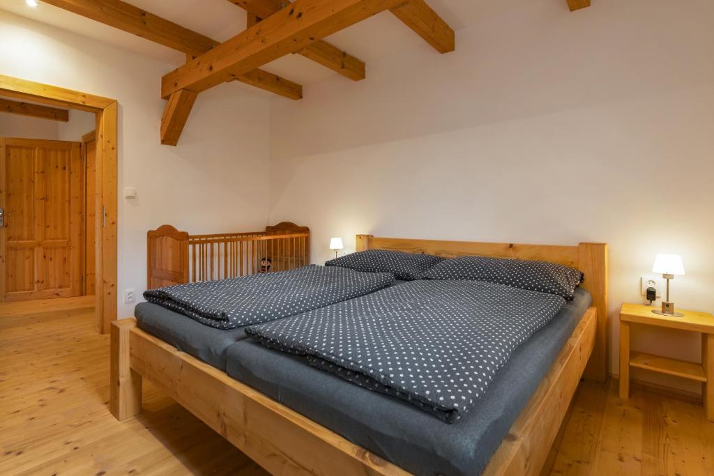 Postel nebo postele na pokoji v ubytování Nocuj