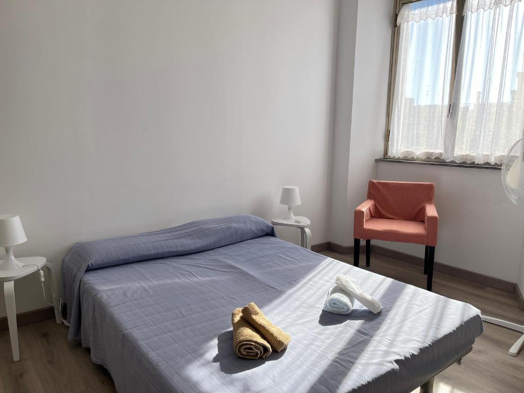 Postel nebo postele na pokoji v ubytování "Ciauru i mare" - Pachino
