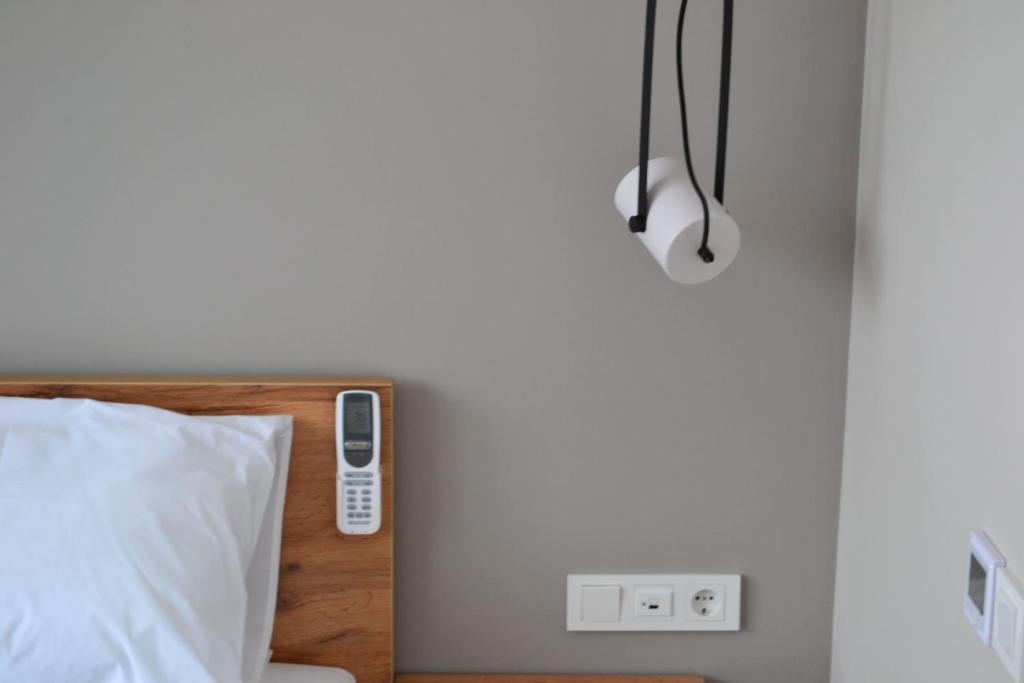 Postel nebo postele na pokoji v ubytování Village apartments Polyana