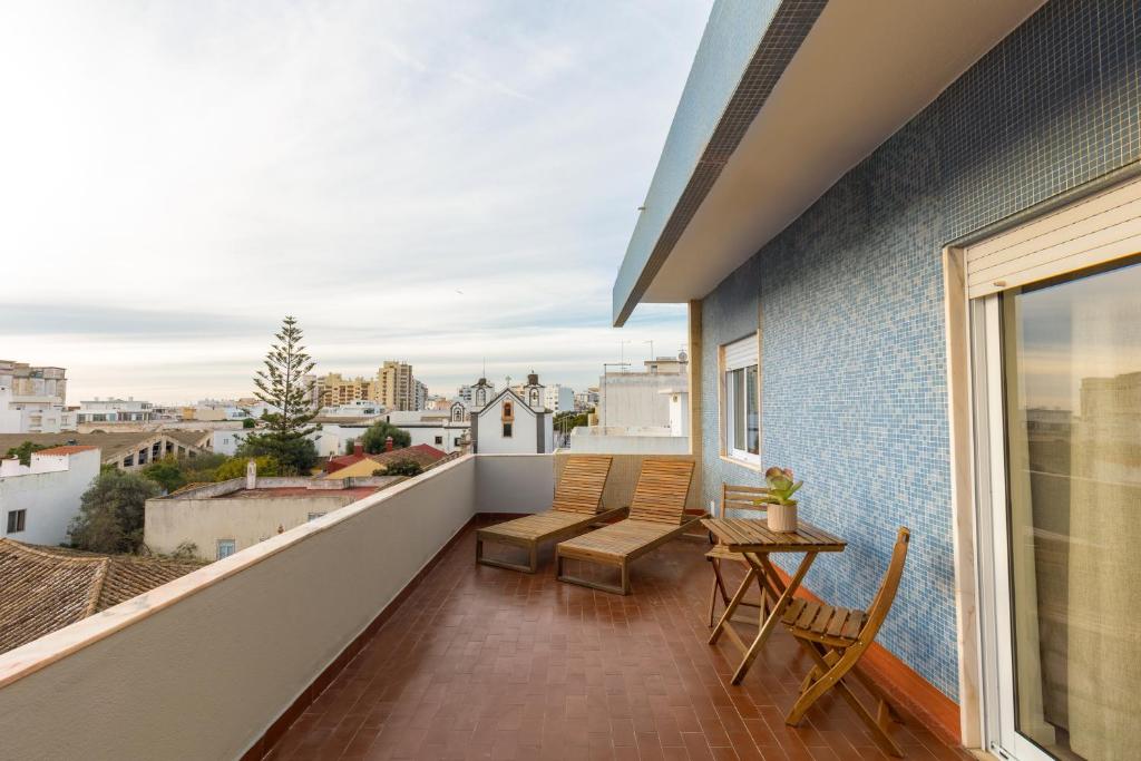 Balkón nebo terasa v ubytování Faro Guest Apartments