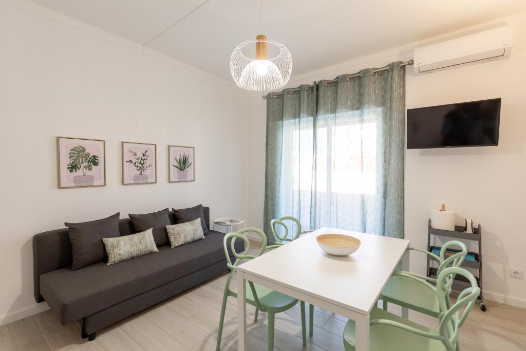 TV a/nebo společenská místnost v ubytování Faro Guest Apartments
