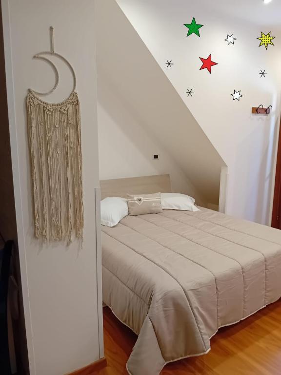 Postel nebo postele na pokoji v ubytování Torre Delle Stelle