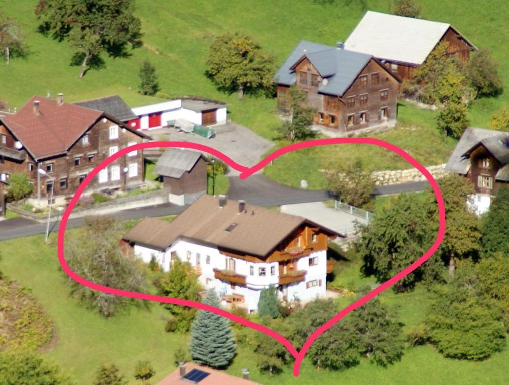 an aerial view of a house with a heart at Landhaus Berthold in Bürserberg