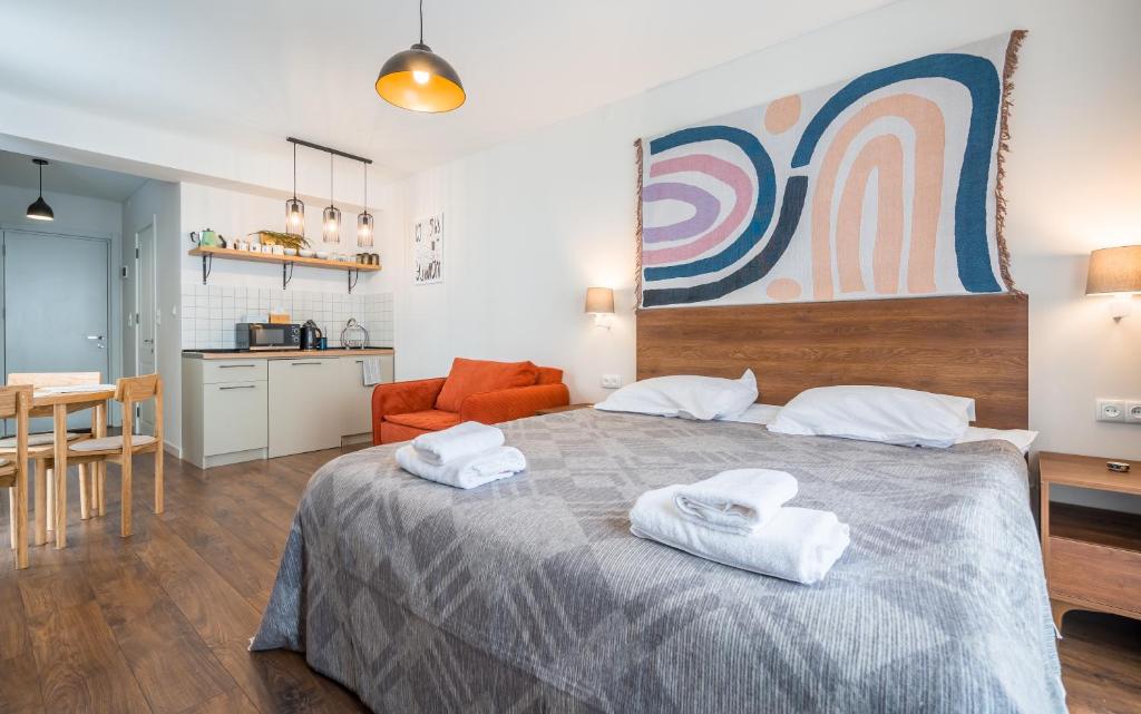 Säng eller sängar i ett rum på New Gudauri Twins Apartment