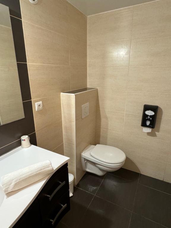Koupelna v ubytování Hôtel Le Médiéval