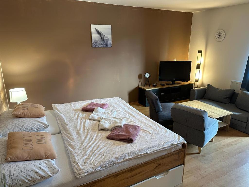 מיטה או מיטות בחדר ב-Apartmán Železná Ruda