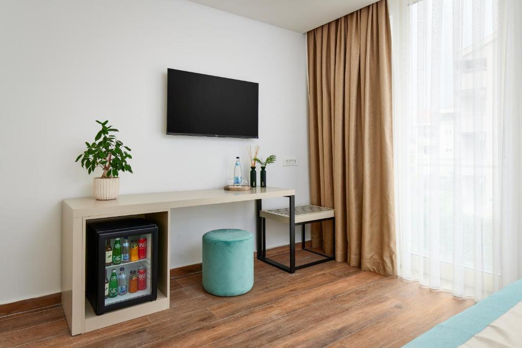 TV a/nebo společenská místnost v ubytování Hotel Splendido Bay