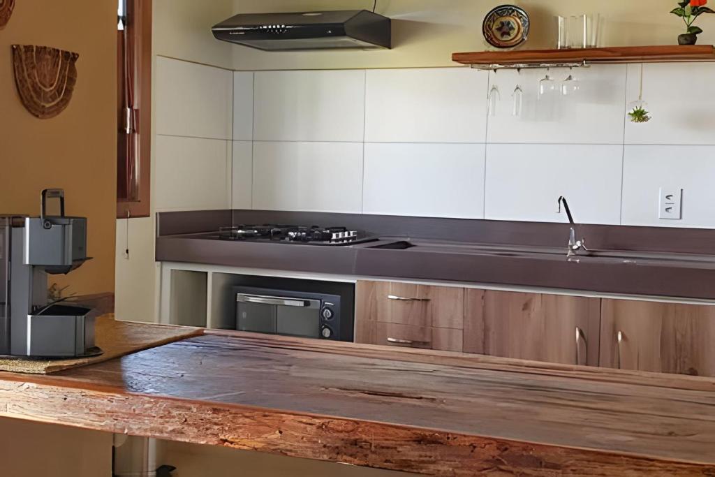 Kuhinja oz. manjša kuhinja v nastanitvi Canto do Paraiso - Apartamento no Centro com ar condicionado