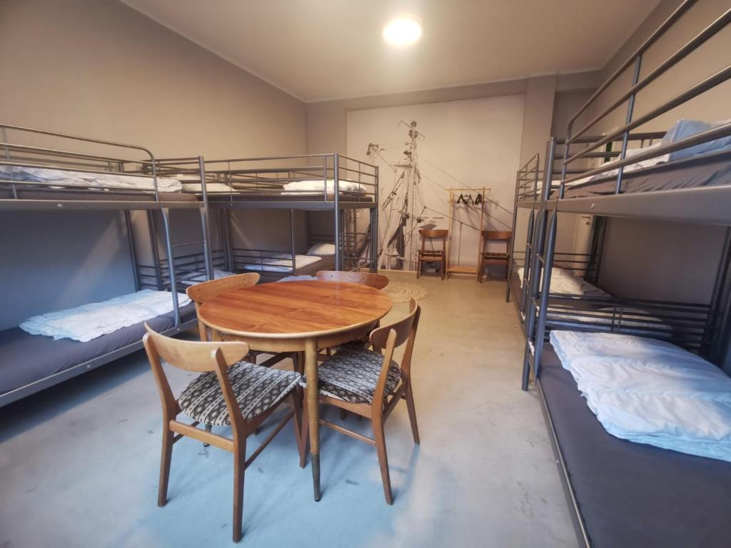 Postel nebo postele na pokoji v ubytování Sleeptide