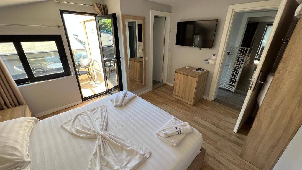 Postel nebo postele na pokoji v ubytování Villa Tramonto Vlore