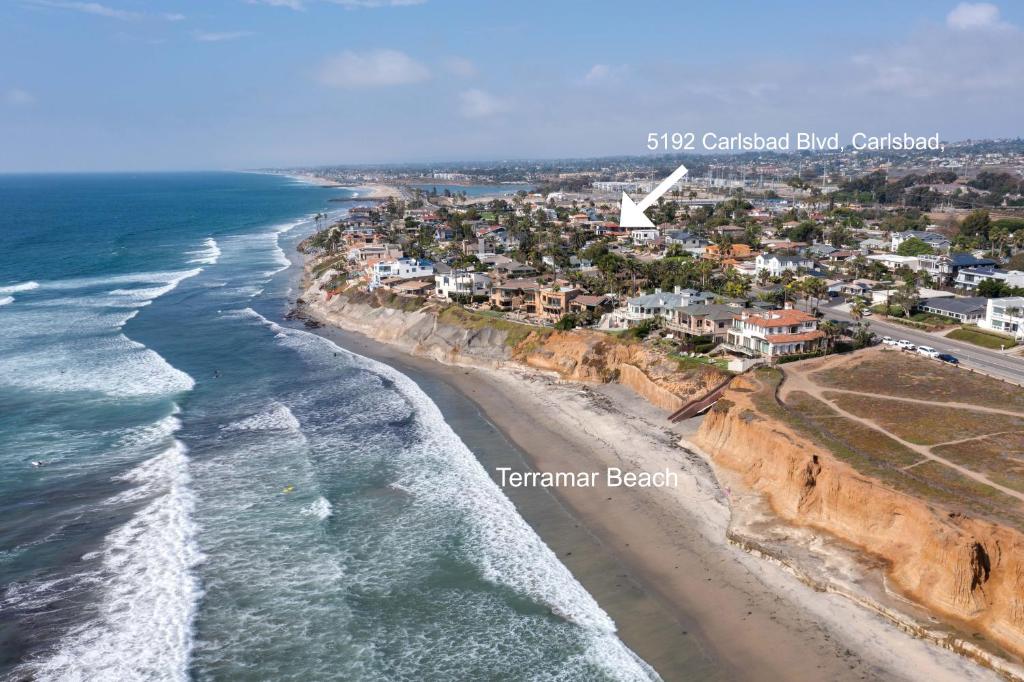 an aerial view of the shoreline of a beach at Rooftop Oceanview Patio - 5BR Remodeled Home in Carlsbad