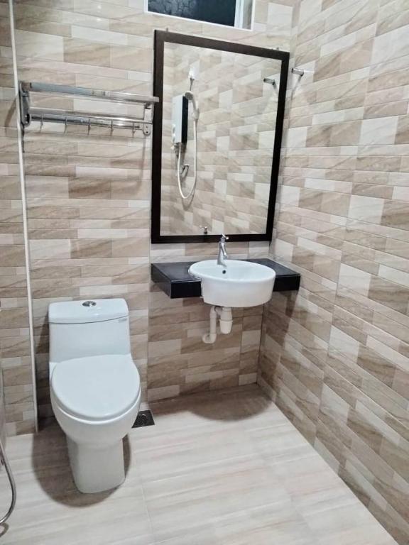 Koupelna v ubytování Weng Kong Homestay