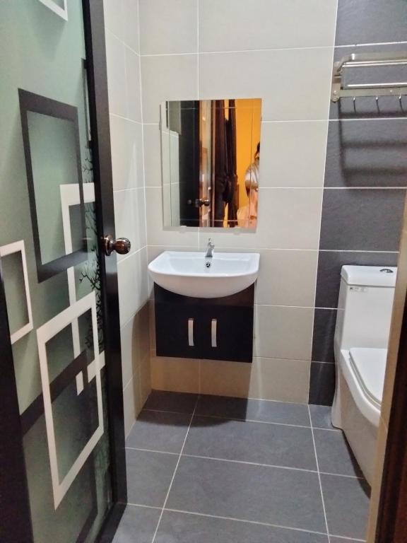 Koupelna v ubytování Weng Kong Homestay
