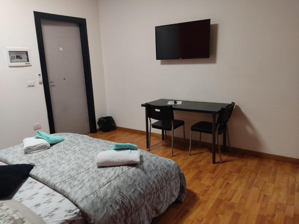Łóżko lub łóżka w pokoju w obiekcie Bunker degli inventori