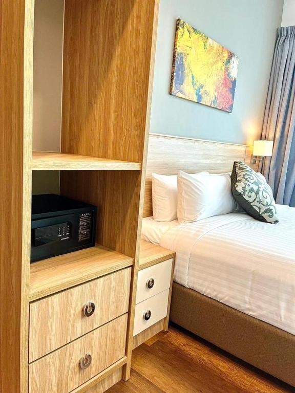 Postel nebo postele na pokoji v ubytování Hotspring 2 Room Suite @ Sunway Onsen with Theme Park View 4 to 6 pax
