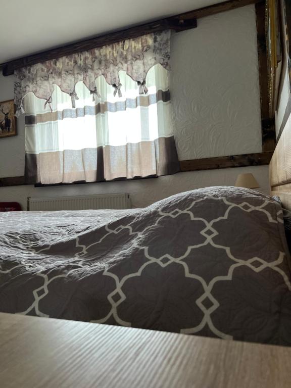 Postel nebo postele na pokoji v ubytování Готельно-Ресторанний комплекс Кичера