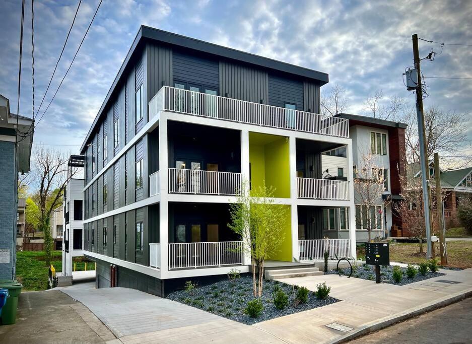 a large building with a yellow and black at Winton Flats by MilaPad in Atlanta