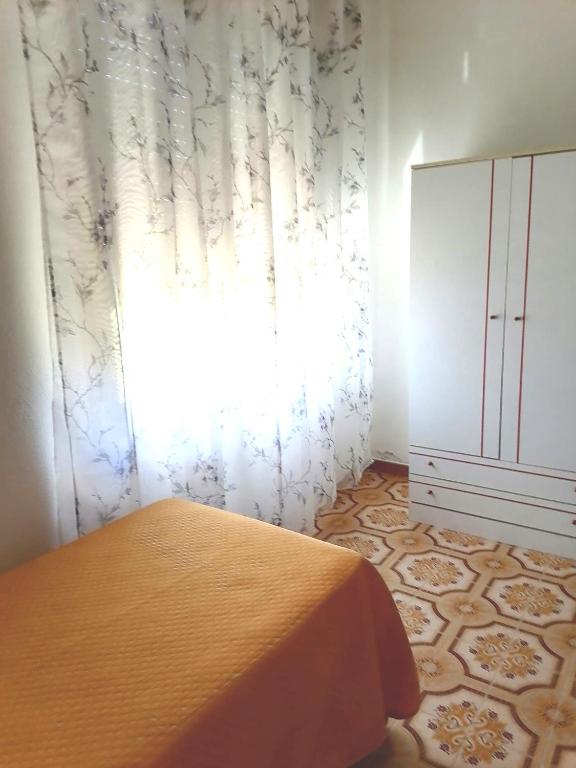 A bed or beds in a room at The Garden