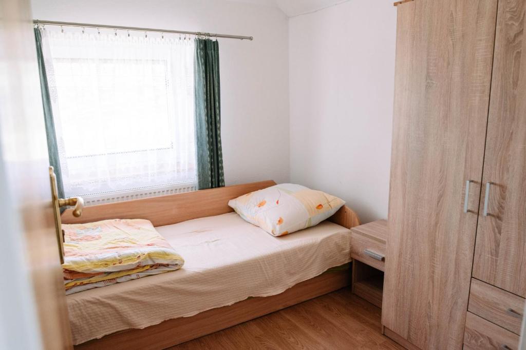 Postel nebo postele na pokoji v ubytování Magnificat