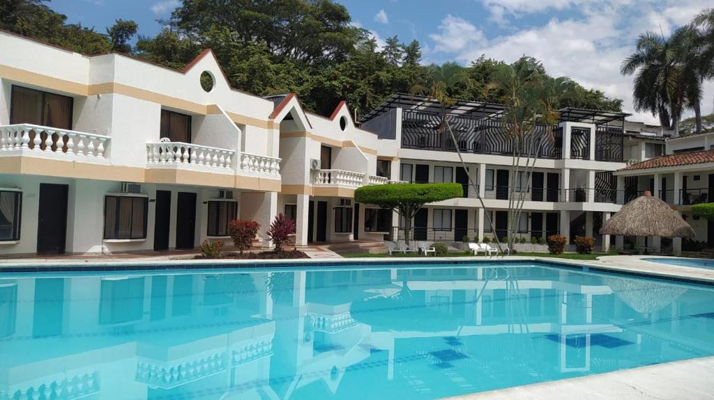 La alberca dentro o cerca de Hotel Las Victorias Palmira