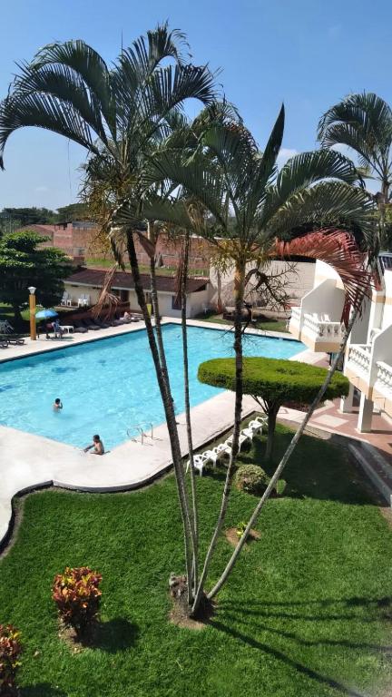 La alberca dentro o cerca de Hotel Las Victorias Palmira