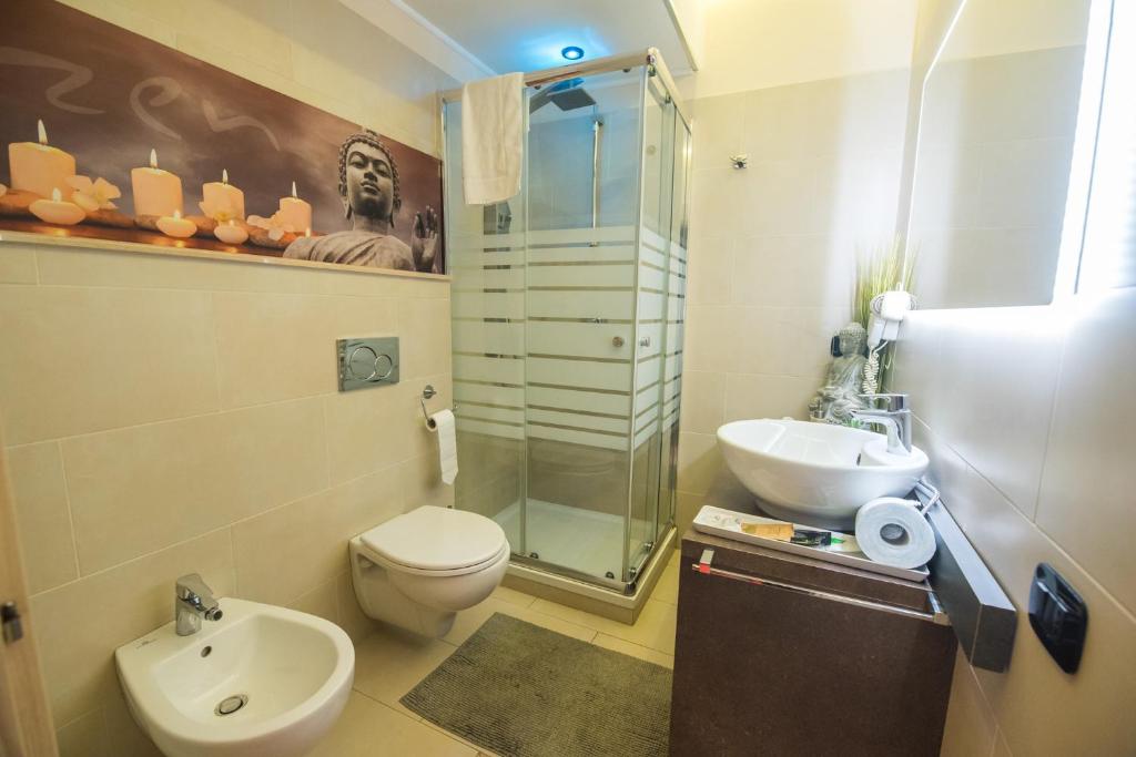 A bathroom at Samsara & Nirvana Suites Apartment