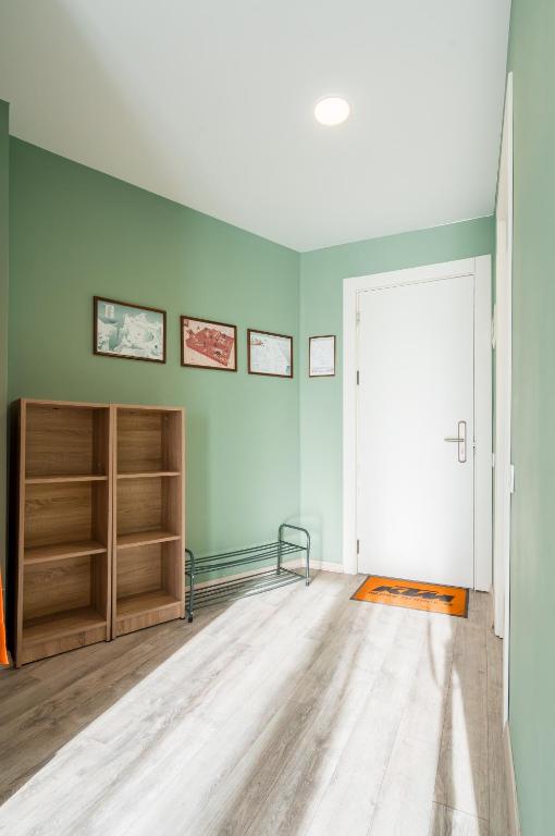 Postel nebo postele na pokoji v ubytování 2-room Apartment NFT New Gudauri 452