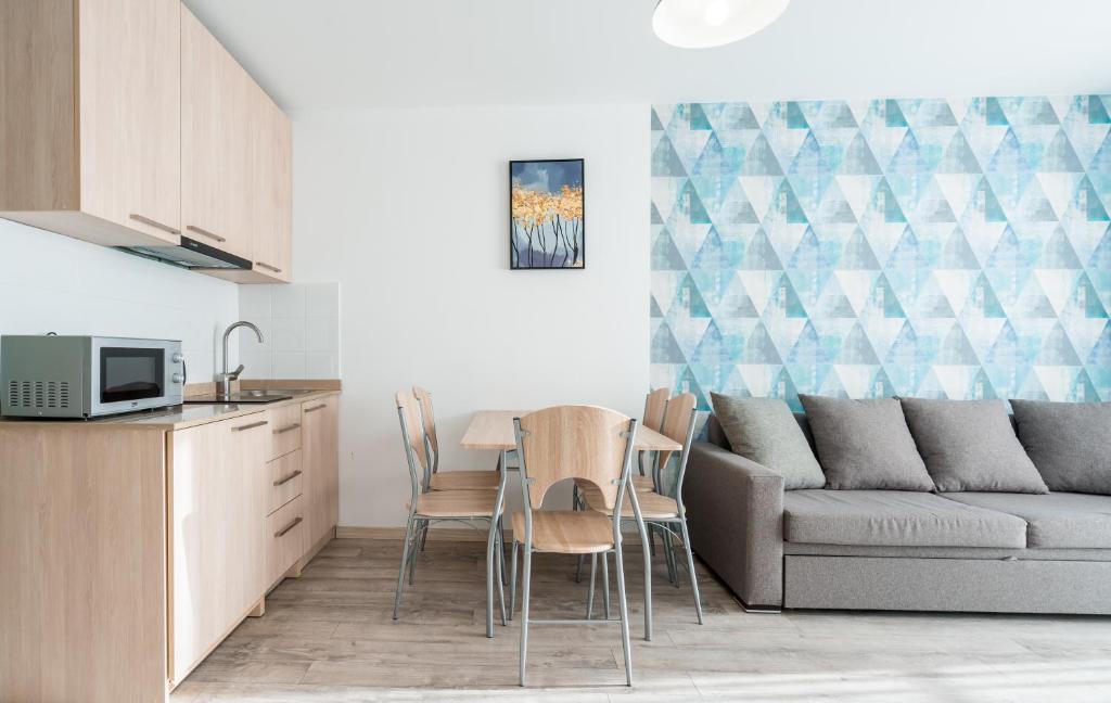 Kuchyň nebo kuchyňský kout v ubytování 2-room Apartment NFT New Gudauri 452