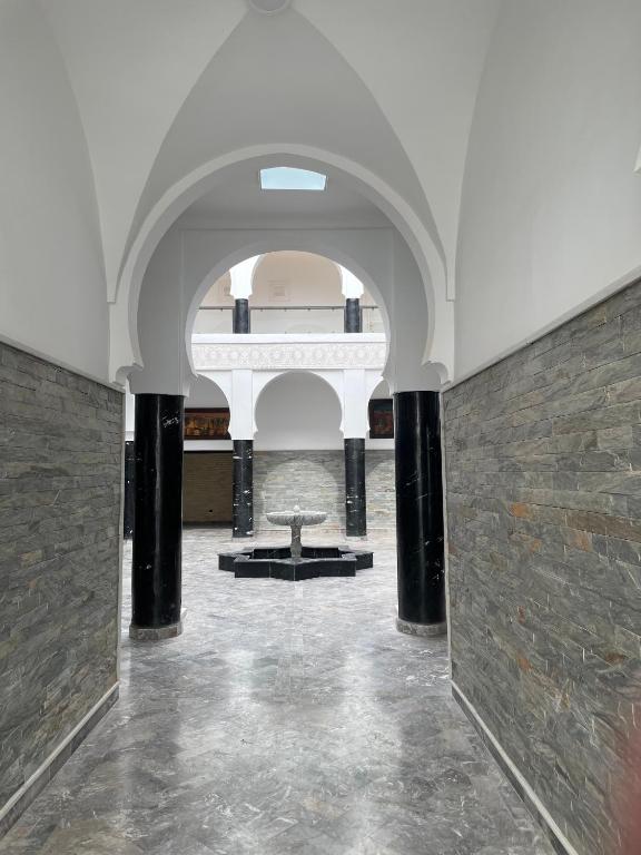 Posezení v ubytování Hôtel Calipau Riad Maison d'Hôtes