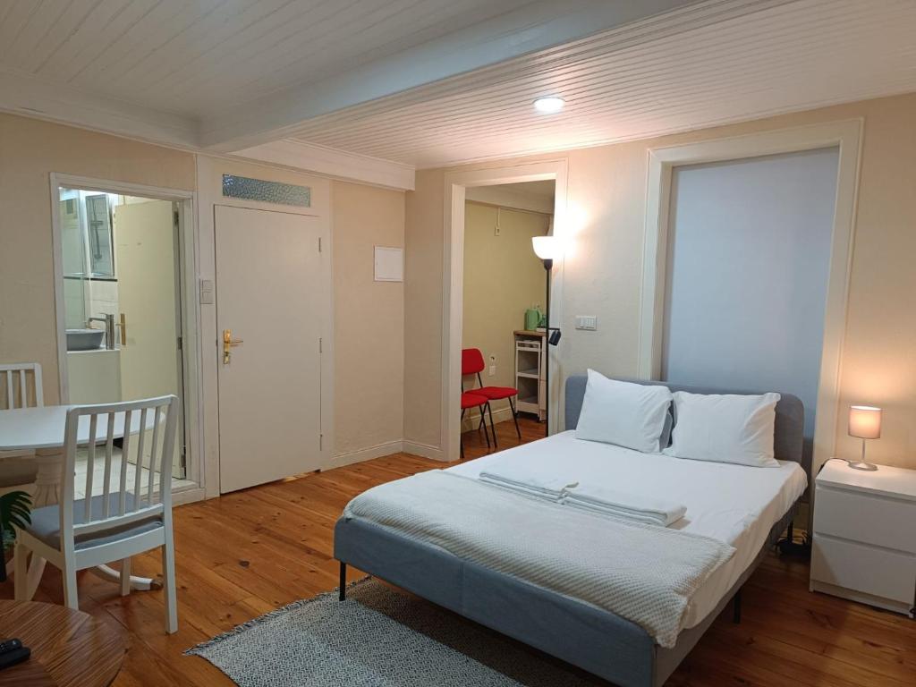 Кровать или кровати в номере Casa Camões
