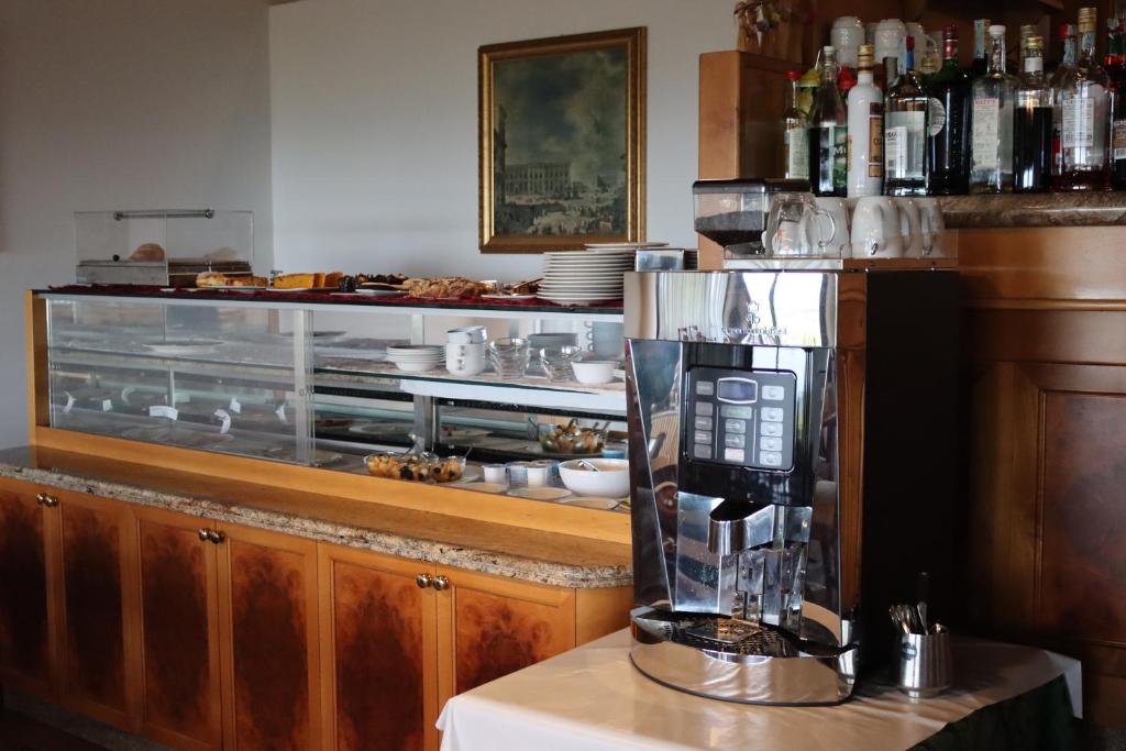 Lounge nebo bar v ubytování Albergo Alla Pineta