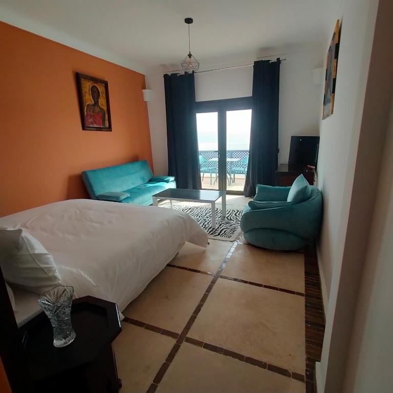 Postel nebo postele na pokoji v ubytování Hôtel Calipau Riad Maison d'Hôtes