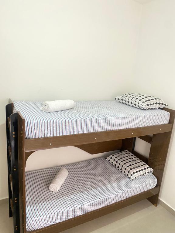 Postel nebo postele na pokoji v ubytování Aconchego! Sua casa com Piscina em Passos!!