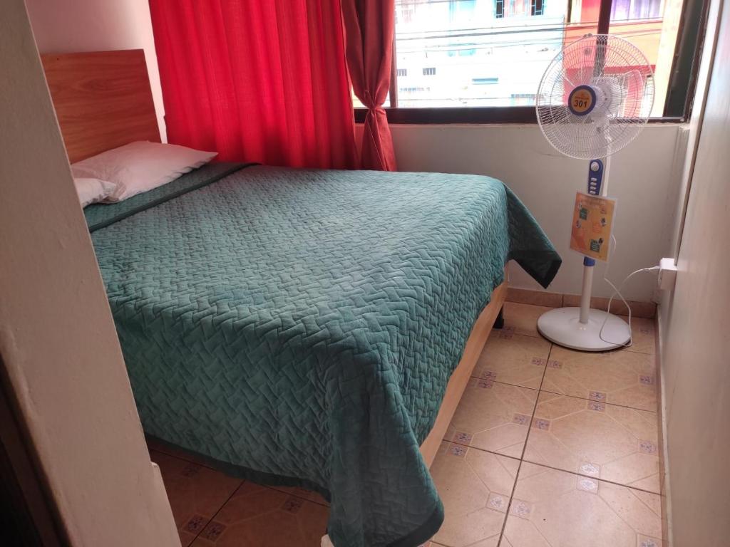 Postel nebo postele na pokoji v ubytování HOTEL DACIN