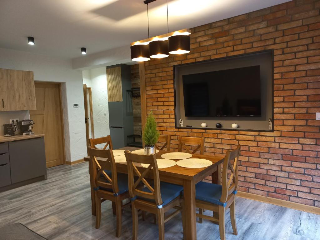 Kuchyňa alebo kuchynka v ubytovaní ARAMIKA apartamenty